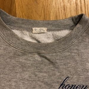 Brandy Melville Tops - Brandy Melville honey crewneck Brandy Melville Tops - Brandy Melville honey crewneck